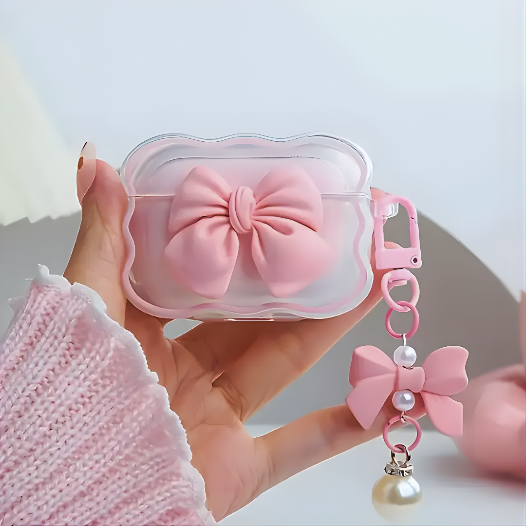Funda Protectora Pink Bow con Bordes Ondulados y Llavero de Perla